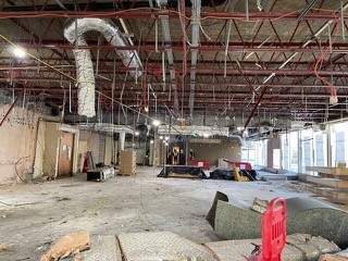 Before: stripped-out commercial floor
